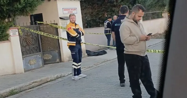 Eşini sokak ortasında öldürdü